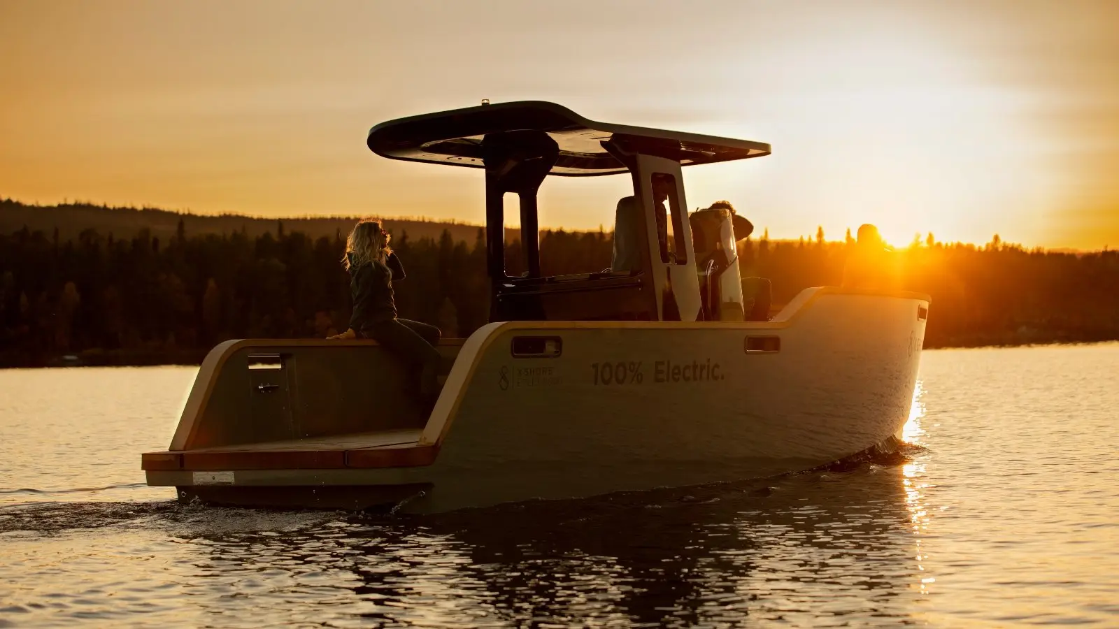 The X Shore Eelex 8000 cruising the Detroit River at sunset